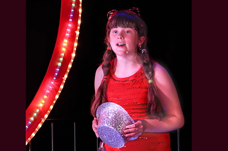 Poppy Pringle sings in the Bawness oin So9lway productionb of Dazzle! the musical